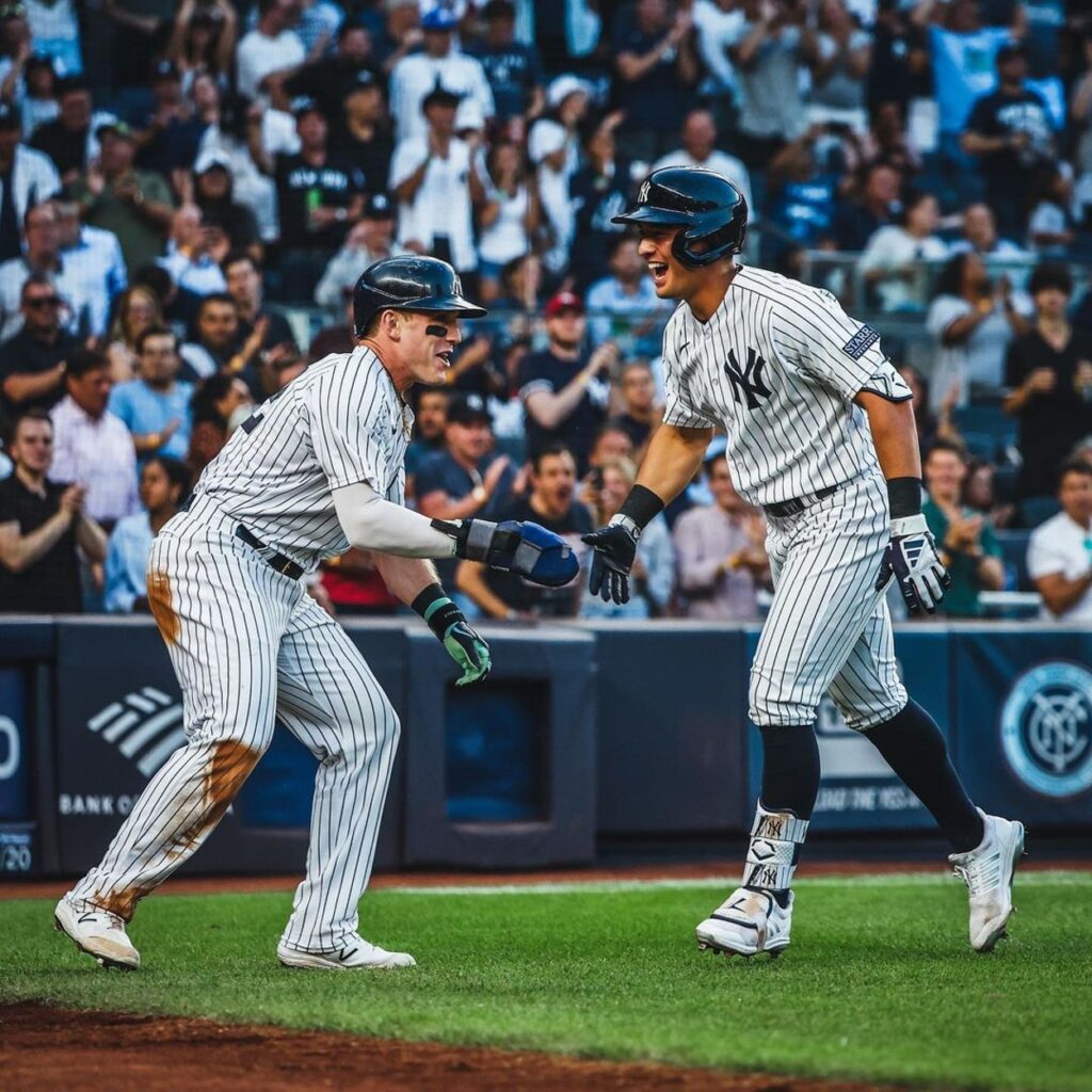 Harrison Bader and Anthony Volpe of the New York Yankees at Yankee Stadium on August 4, 2023.