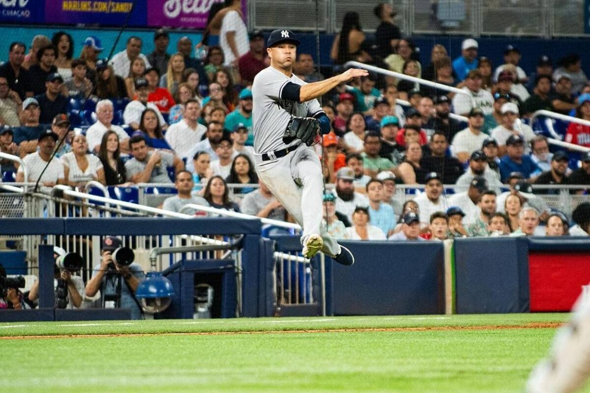 Isiah Kiner-Falefa makes a throw while playing at the third base during the Yankees vs. Marlins game on August 12, 2023, in Miami.