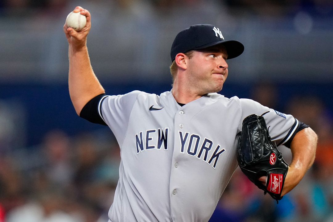 Aug 12, 2023; Miami, Florida, USA; New York Yankees relief pitcher Michael King (34) throws a pitch against the Miami Marlins during the first inning at loanDepot Park.