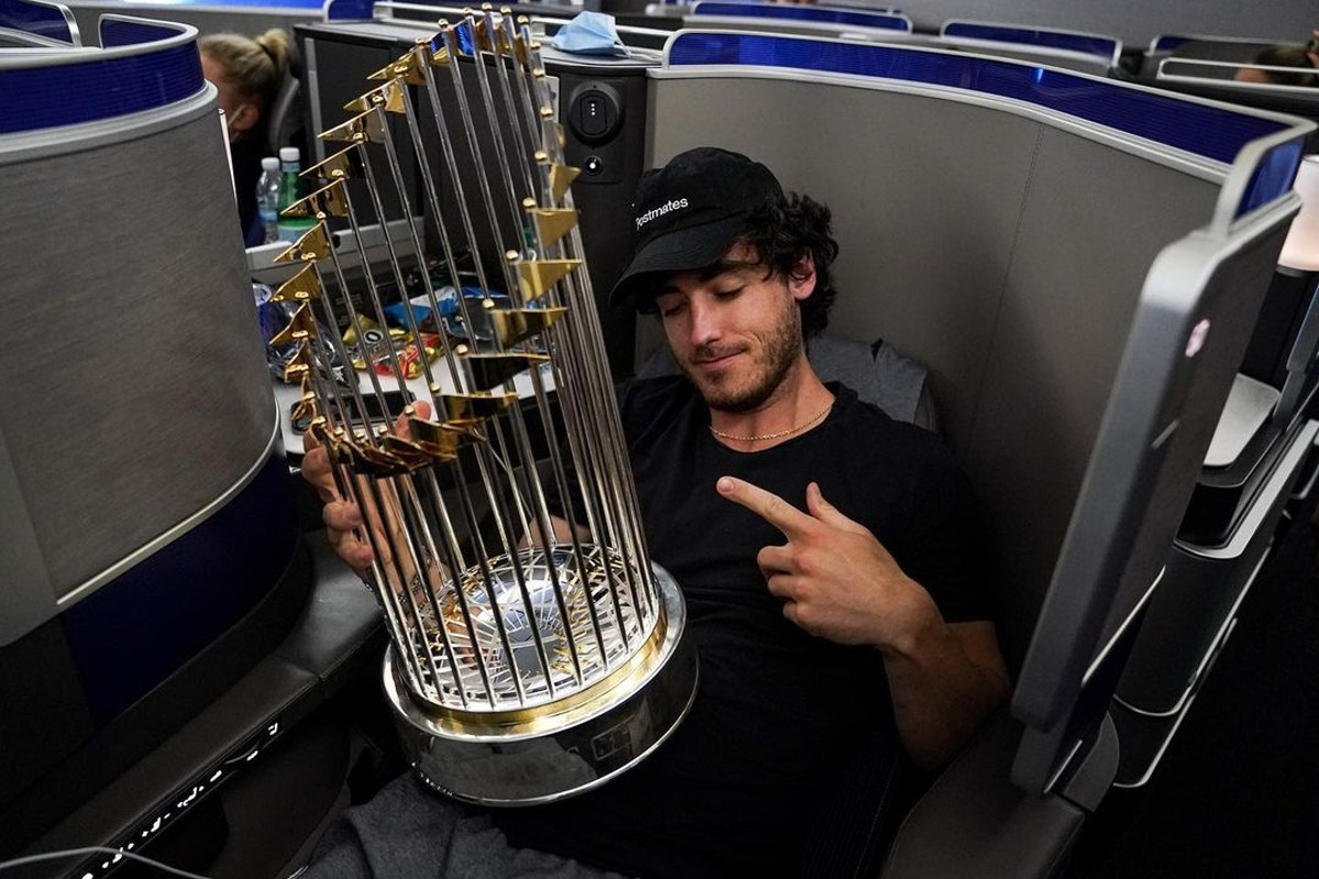Yankess offseason target Cody Bellinger with 2020 WS trophy.