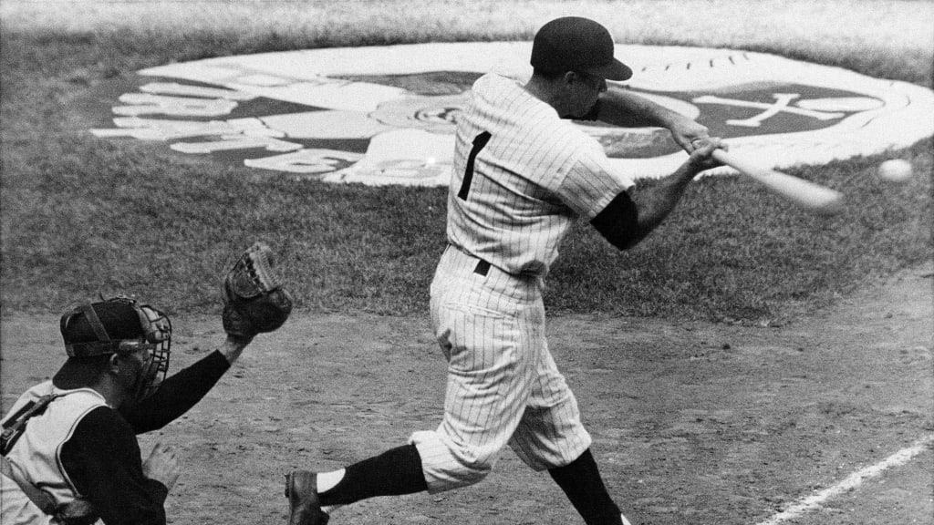 Roger Maris (right) and Tony Kubek hit Yankee home runs on August