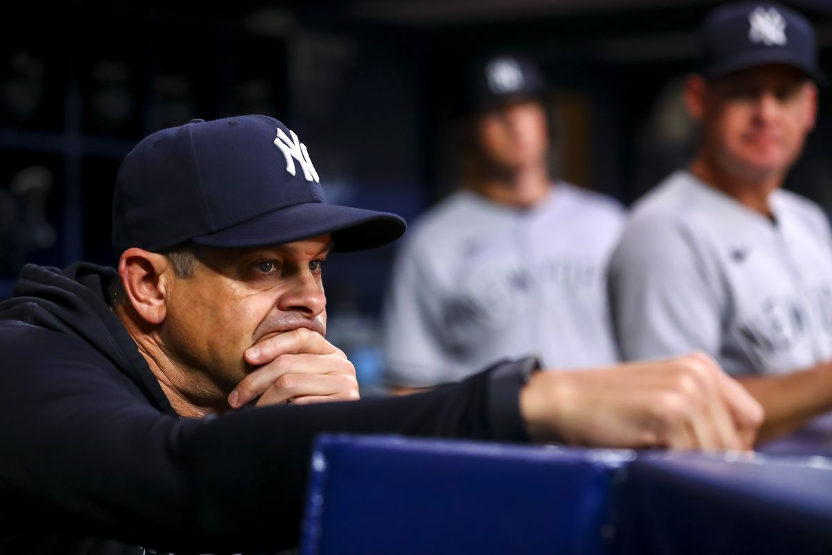 New York Yankees manager Aaron Boone looks pensive as the Yankees lost to the Rays in Tampa on Aug 27, 2023.