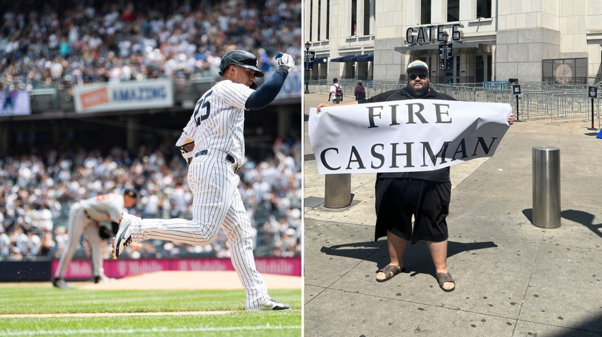 Yankees Gleyber Torres, who is rumored to be traded, and Yankees fan Jon is holding a "Fire Cashman" poster outside Yankee Stadium on August 1, 2023.