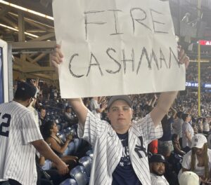 A Yankees fan holds a 