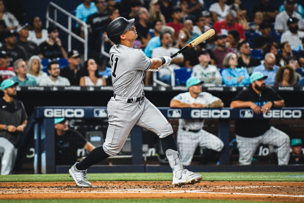 Yankees' Anthony Volpe hits a 404-feet home run to left field at LoanDepot Park vs. the Miami Marlins on August 11, 2023.