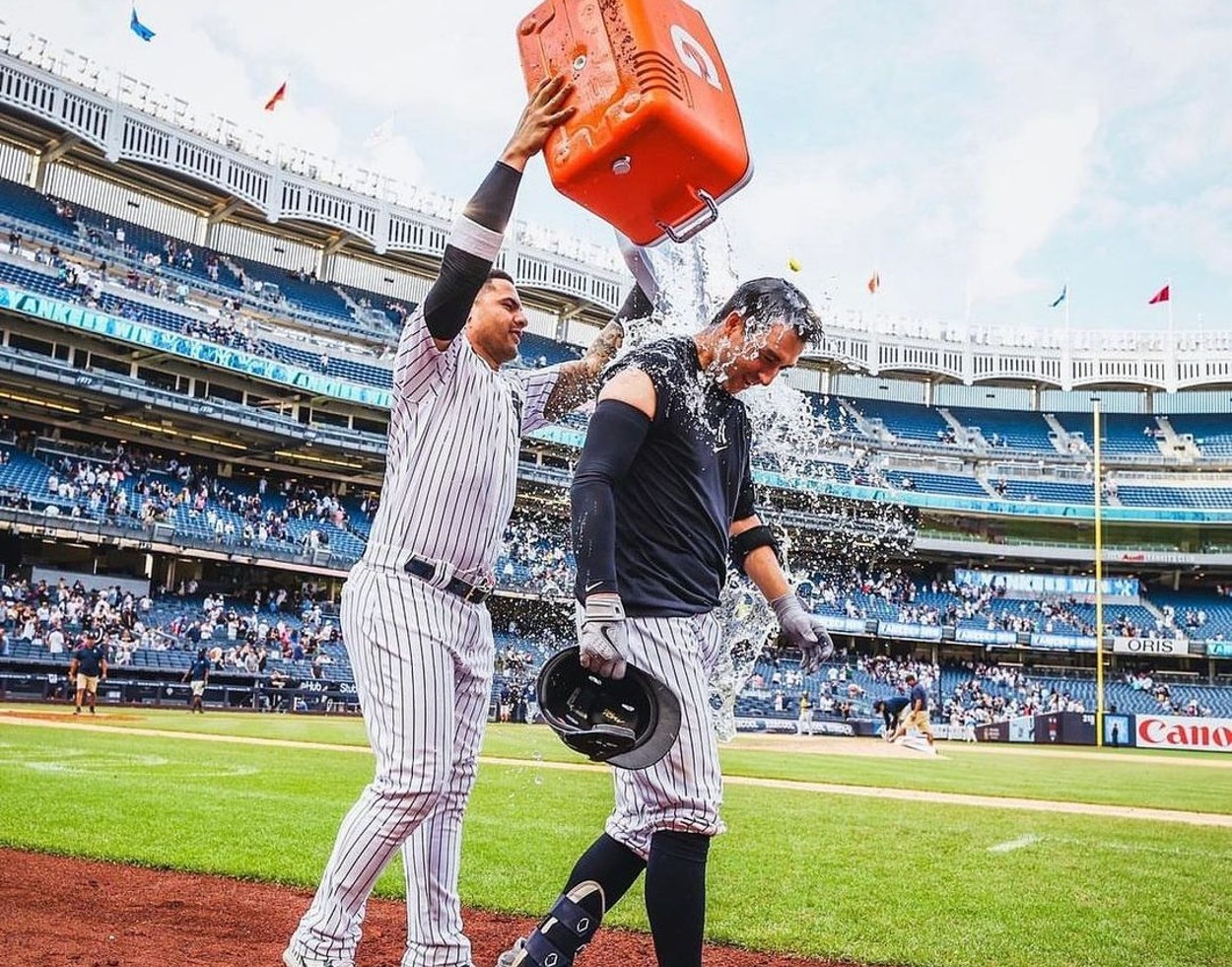 Kyle Higashioka is greeted with ice bucket after helping Yankees notch up an astonishing win over the Brewers on Sept 10, 2023, at Yankee Stadium.