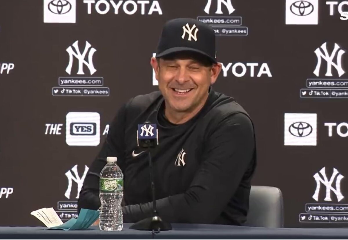 Aaron Boone is talking to reports after the Yankees beat the D'Backs 6-4 on Sept. 25, 2023.