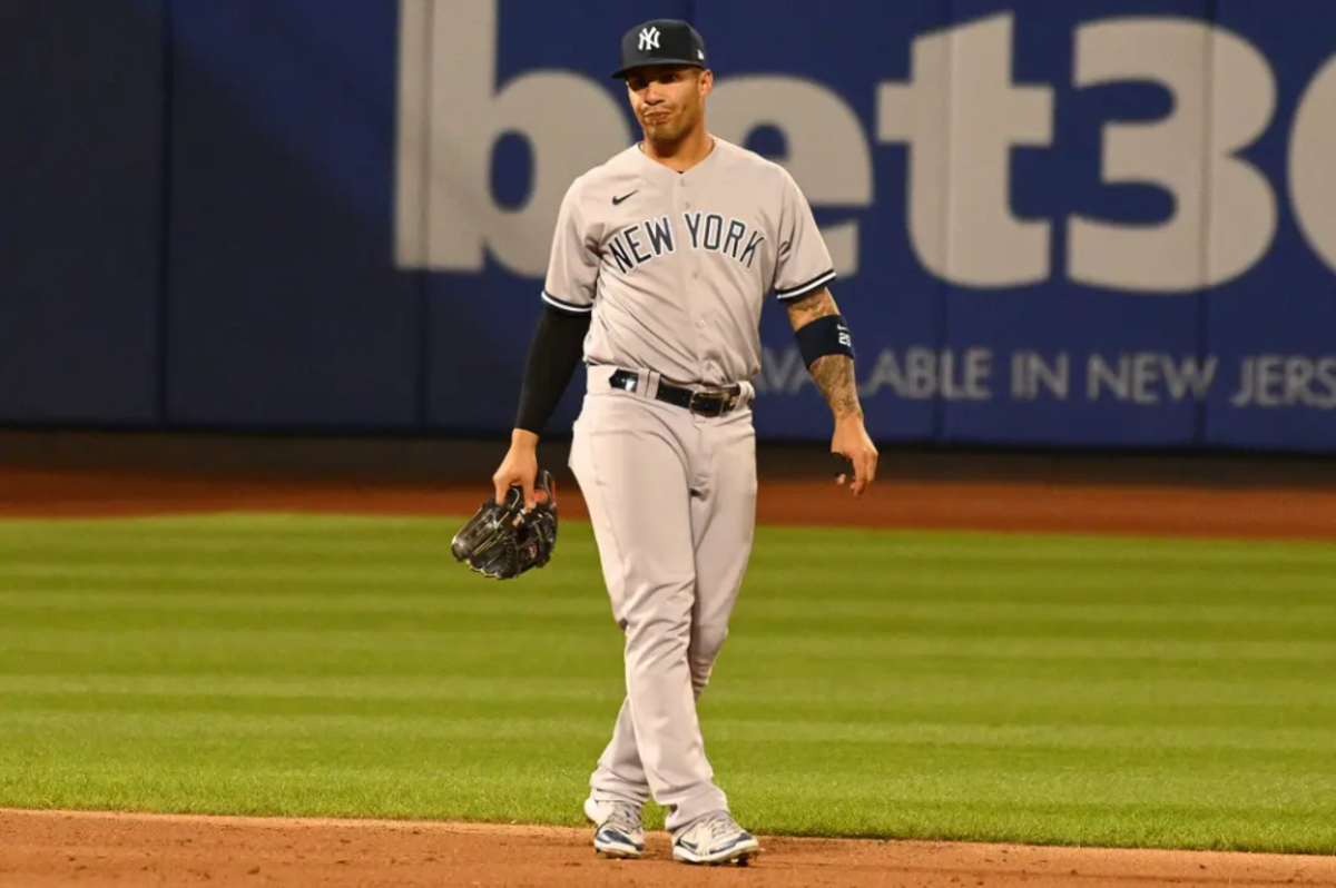 Gleyber Torres New York Yankees Unsigned Runs Off The Field Photograph