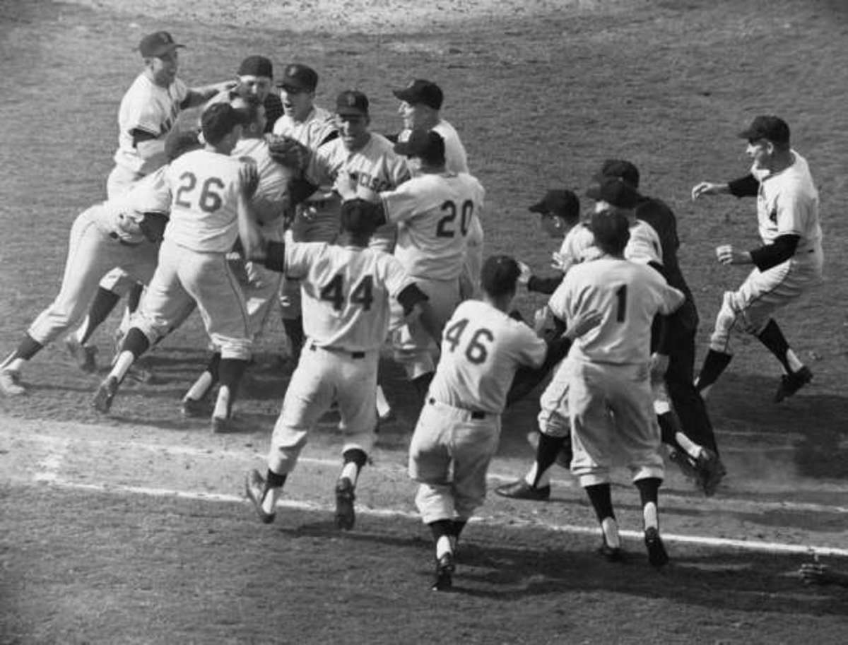 The Yankees are celebrating after beating the Giants 1-0 in Game 7 to win the 1962 World Series.