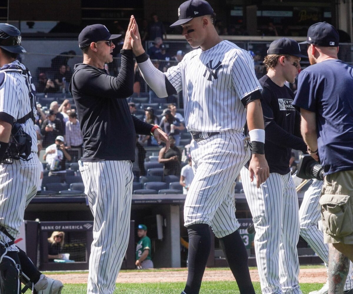 New York Yankees manager Aaron Boone is with star slugger and captain Aaron Judge.