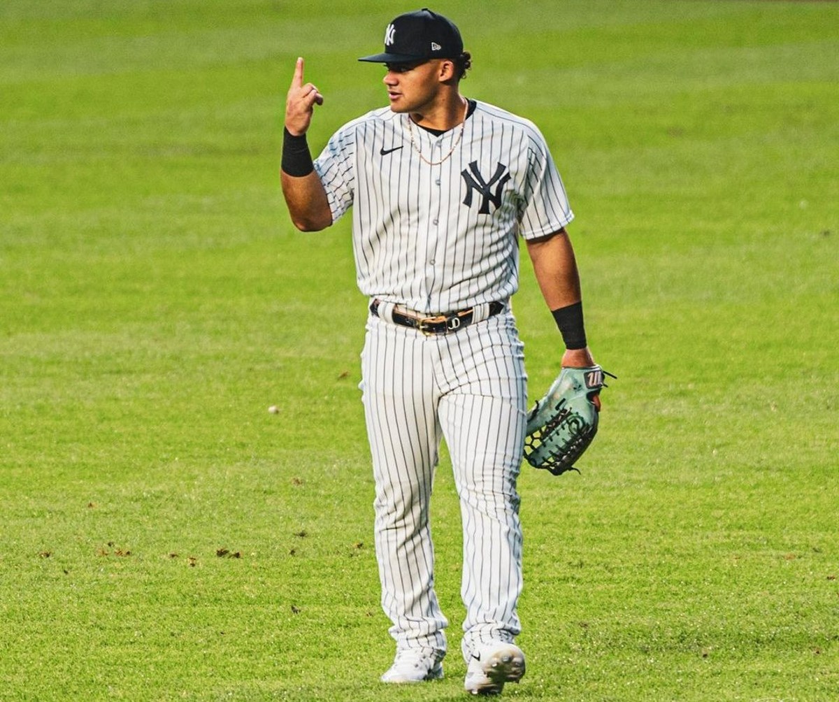 Jasson Dominguez responds to a roll call by Yankees fans on Sept 5, 2023, at Yankee Stadium.