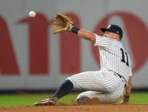 Yankees shortstop Anthony Volpe makes a defensive display against the Brewers at Yankee Stadium on Sept. 10, 2023.