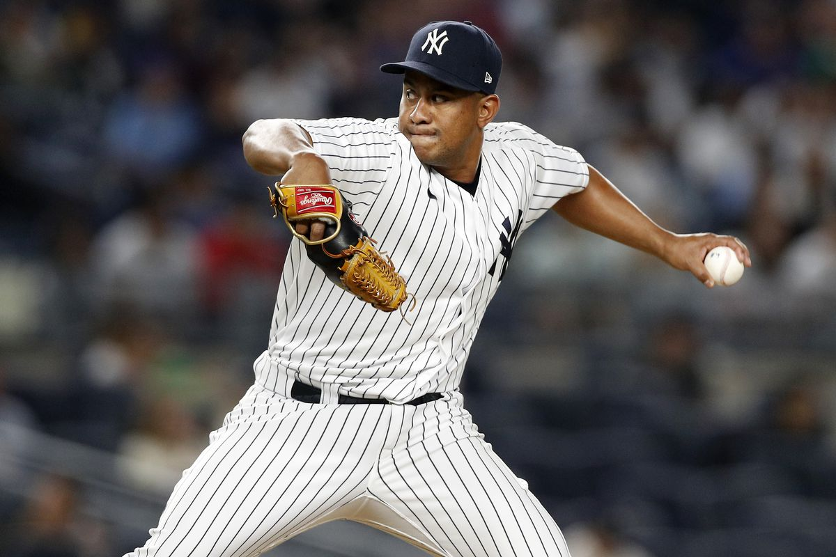 New York Yankees relief pitcher Wandy Peralta throws against the