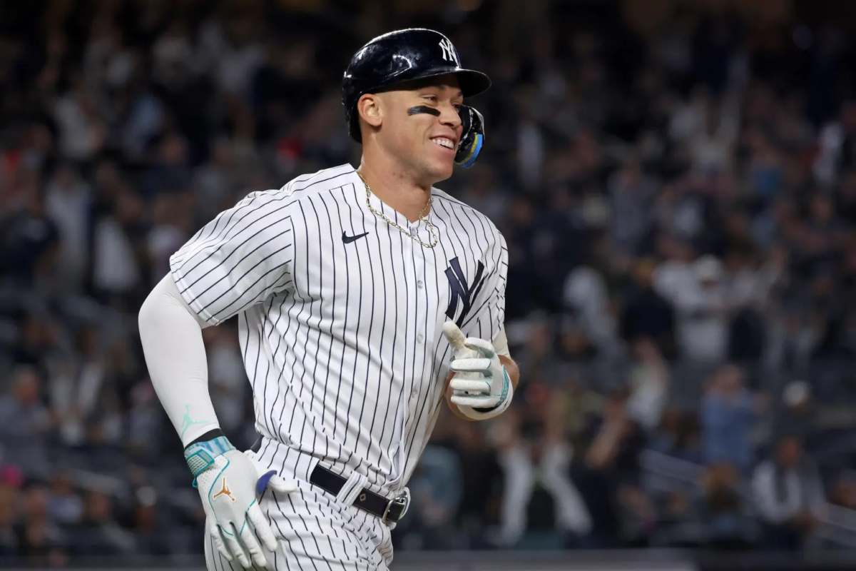 New York Yankees right fielder Aaron Judge (99) reacts as he rounds the bases after he hits a solo homer during the 7th inning when the New York Yankees played the Arizona Diamondbacks.