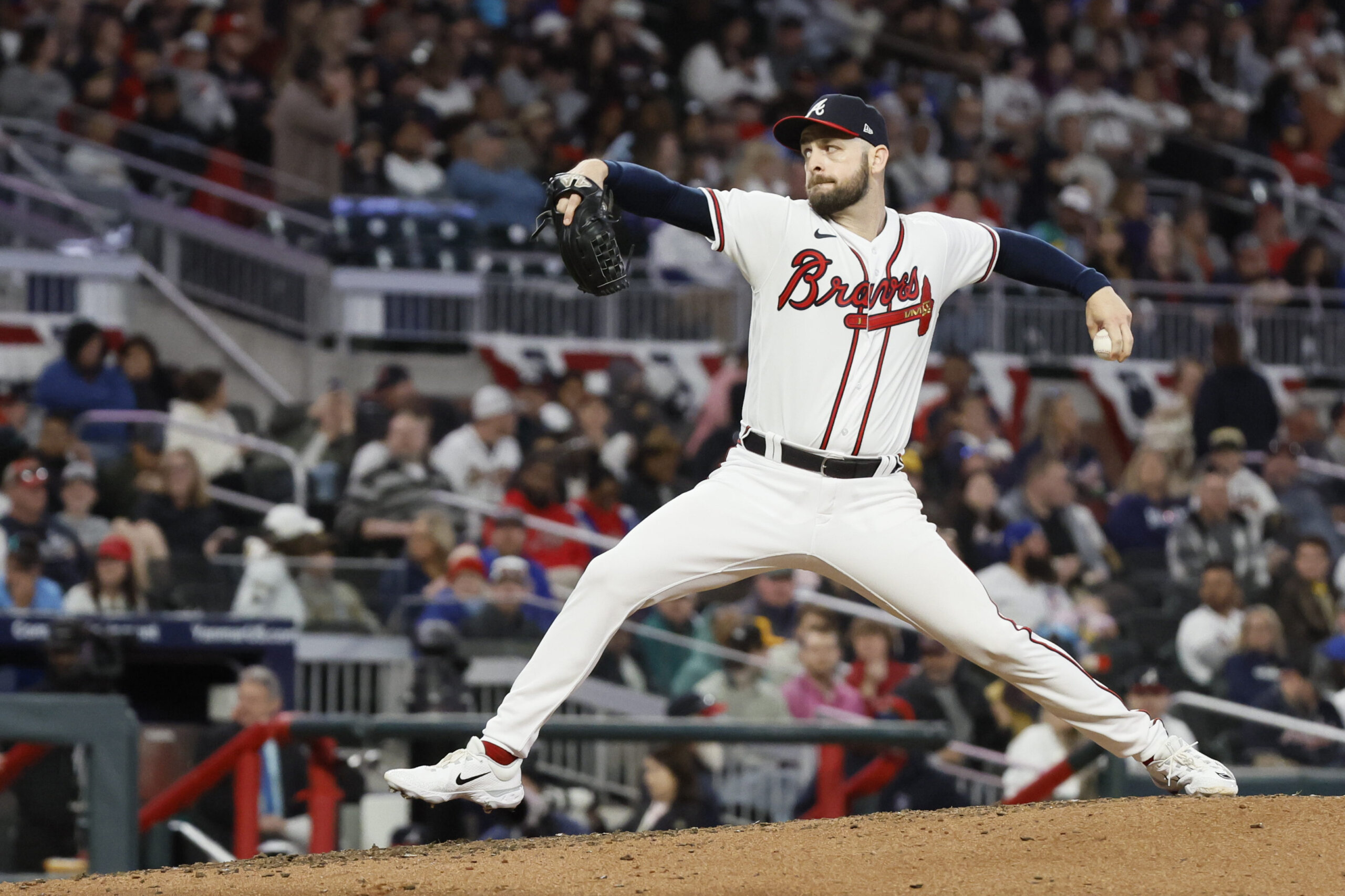 Atlanta Braves relief pitcher Lucas Luetge (63) delivers during the fifth inning against San Diego Padres batter at Truist Park on Sunday, April 9, 2023.