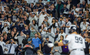 Almost all of the 46,707 fans in attendance Sunday night are on their feet as Yankees' Aaron Judge steps up to the plate during the third inning against the Boston Red Sox on Sunday, September 25, 2022 at Yankee Stadium. Judge walked.
