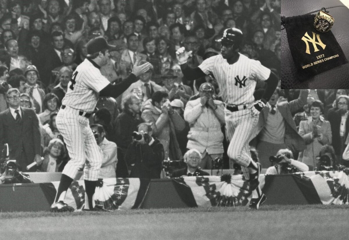 Munson celebrates with Willie Randolph, who hit a home run in the 1977 World Series Game 1 at Yankee Stadium.