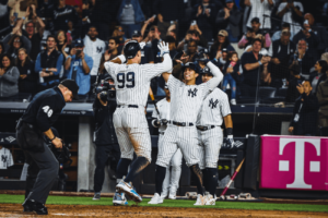 The New York Yankees players in action on Friday, September 23.