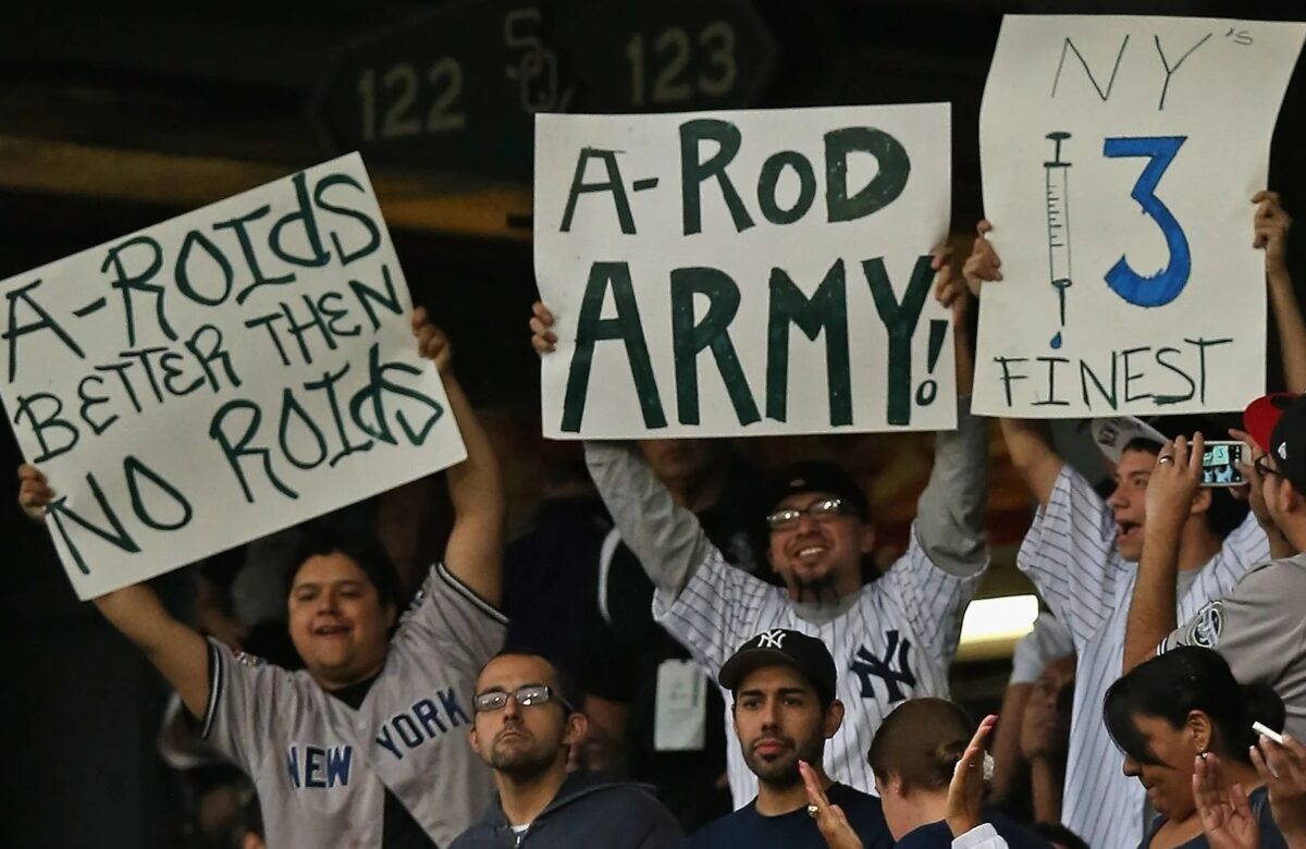 Yankees fans are holding placards as Alex Rodriguez steps up to bat in Chicago on Aug 5, 2023.