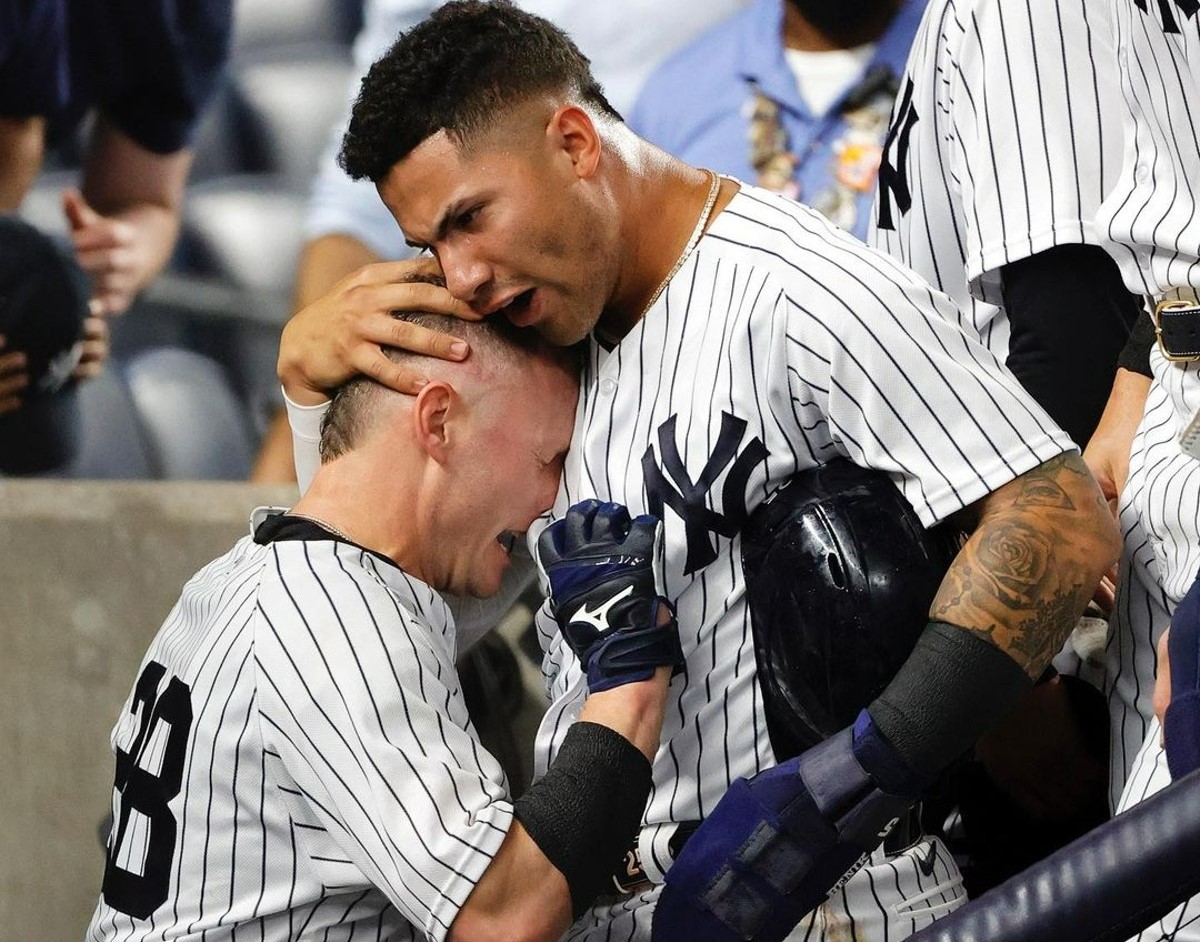 Yankees' Gleyber Torres congratulates ex-teammate Josh Donaldson after his grand slam against the Tampa Bay Rays at Yankee Stadium on August 17, 2022.