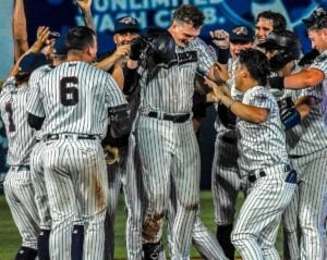 Yankees prospects at Somerset Patriots celebrate following their win in September 2023.