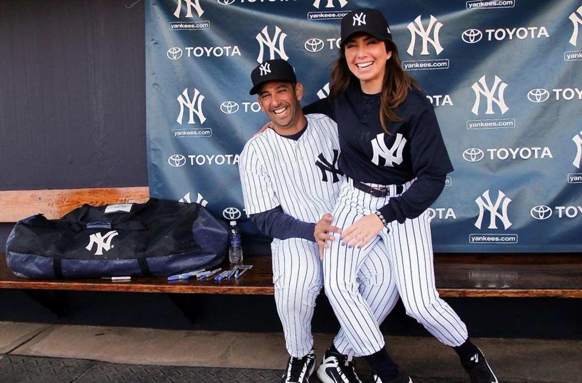La leyenda de los Yankees Jorge Posada con su esposa Laura.