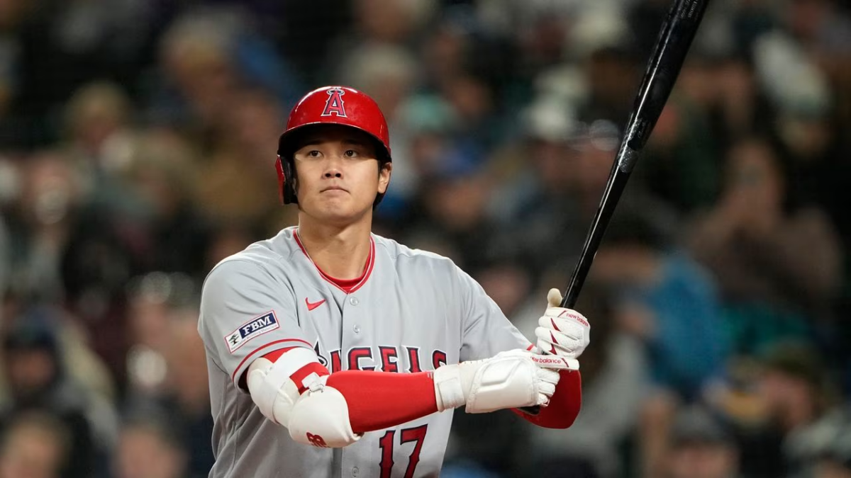 Yankees' target Shohei Ohtani delivers a pitch during a game.