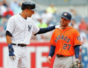 Yankees' Derek Jeter with Astros' Jose Altuve at Yankee Stadium on August 21, 2014.