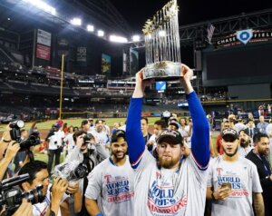 Ex-Yankees pitcher Jordan Montgomery with the 2023 World Series trophy won by the Texas Rangers