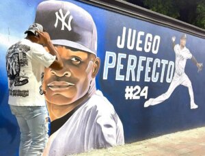 A wall painting celebrates ex-Yankees pitcher German Domingo's 2023 perfect game in San Pedro de Macoris, Dominican Republic.