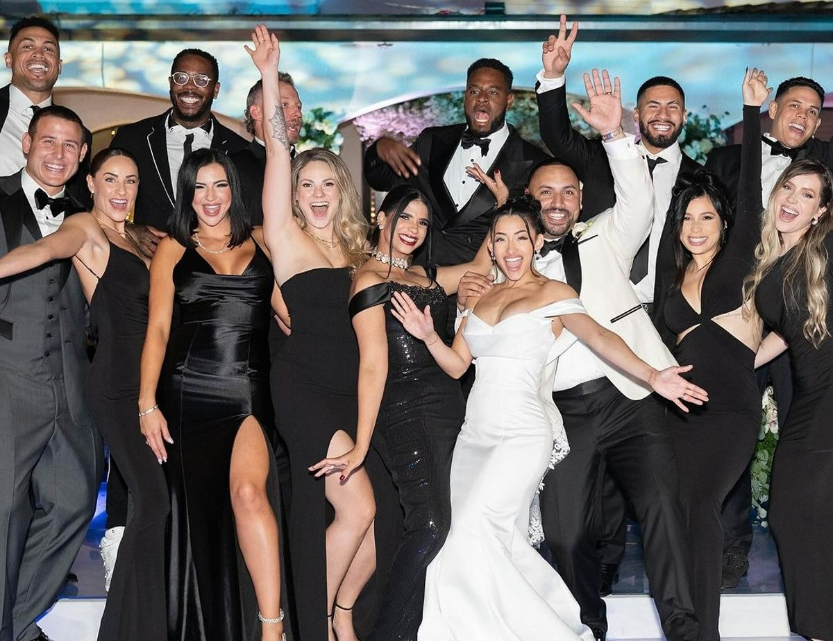 Nestor Cortes and his wife Alondra Russy along with current and former Yankees mates at their wedding ceremony on Nov. 26, 2023.