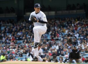 Yankees great Mike Mussina is pitching in 2003.