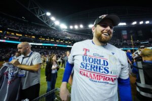 Jordan Montgomery celebrates after winning the 2023 World Series with Texas.