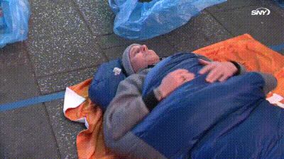 Brian Cashman in his sleeping bag as he prepares for tonight's Covenant House Sleep Out in Times Square on Nov 17, 2023.