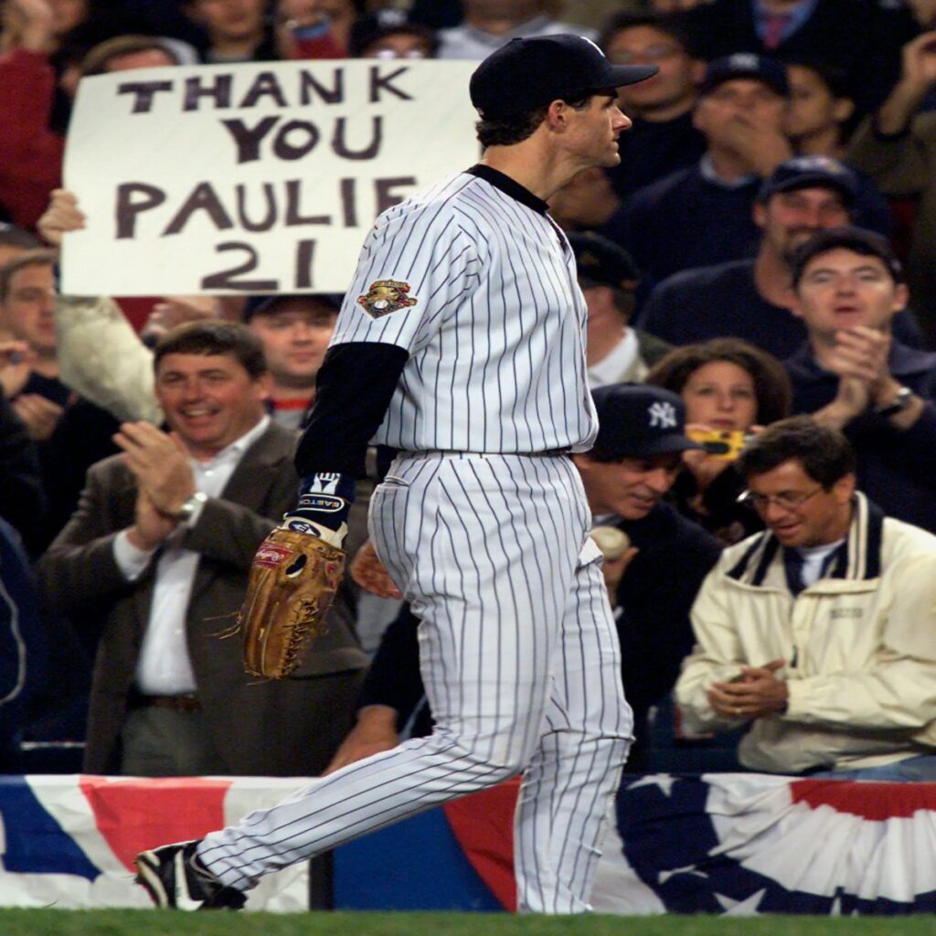 Yankees Paul O’Neill leaves the field past cheering fans in the ninth inning of Game 5 of the World Series against the Arizona Diamondbacks in 2001.