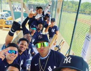 Yankees prospects with farm coach Rachel Balkovec