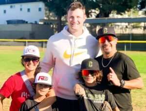 Yankee Pitcher Gerrit Cole with young fans and their family.