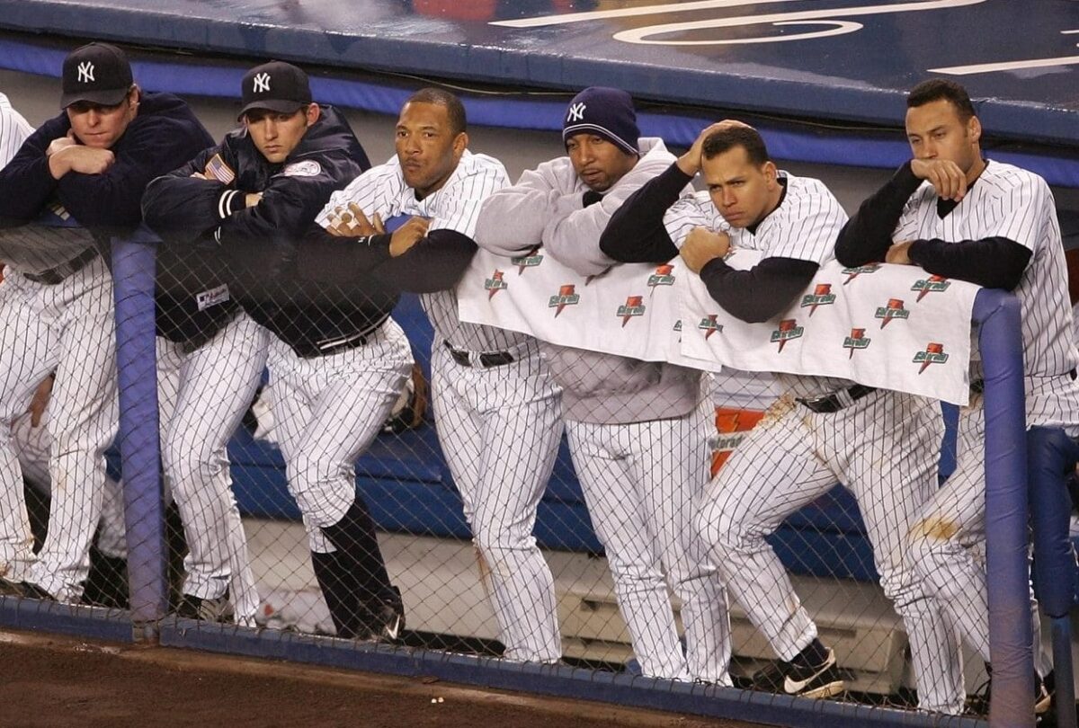 The 2004 New York Yankees dugout is in despair as the Red Sox on their way to win the ALCS Game 6 on October 19, 2004, at Yankee Stadium.