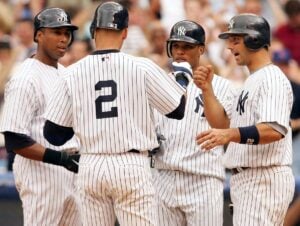 The captain of 2005 New York Yankees Derek Jeter is with Jorge Posada, Garry Sheffield, and Bernie Williams on June 18, 2005.