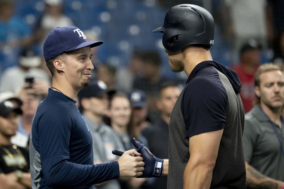 Yankees captain Aaron Judge with San Diego pitcher Blake-Snell in May 2023.