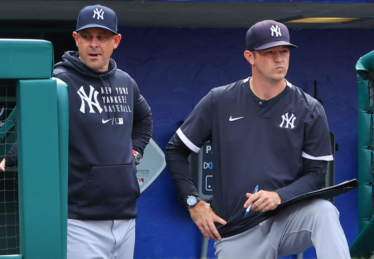 Yankees manager Aaron Boone and pitching coach Matt Blake at Citizen Bank Park, Philadelphia, in 2023.