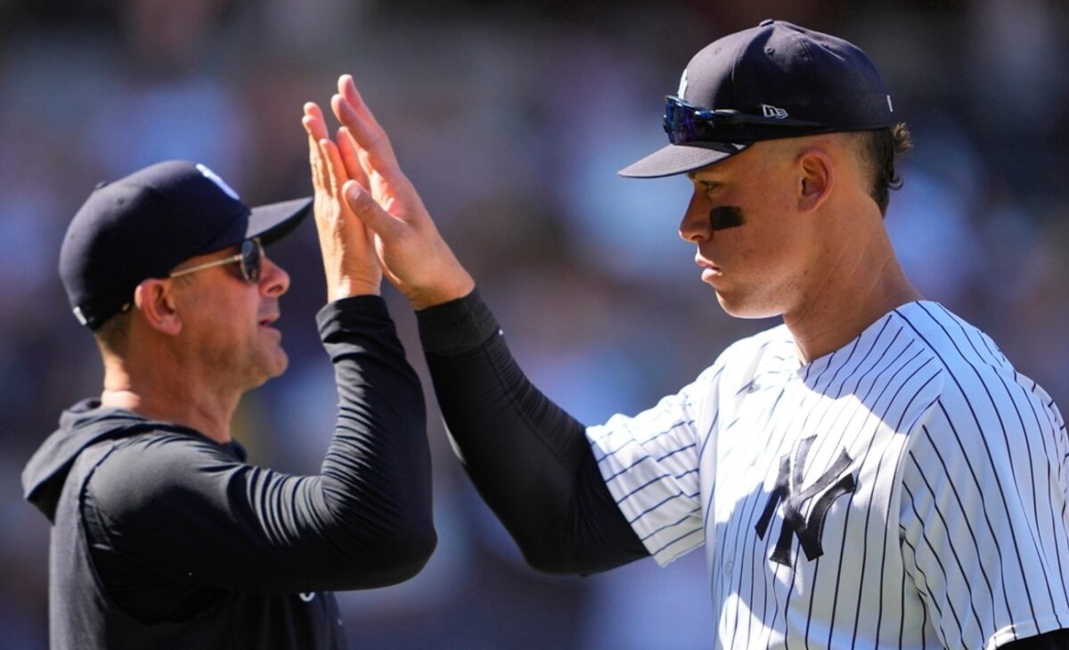 Manager Aaron Boone is with Yankees captain Aaron Boone during the 2023 season.