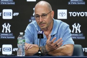 New York Yankees general manager Brian Cashman gestures while speaking during a news conference before a baseball game against the Washington Nationals Wednesday, Aug. 23, 2023, in New York.