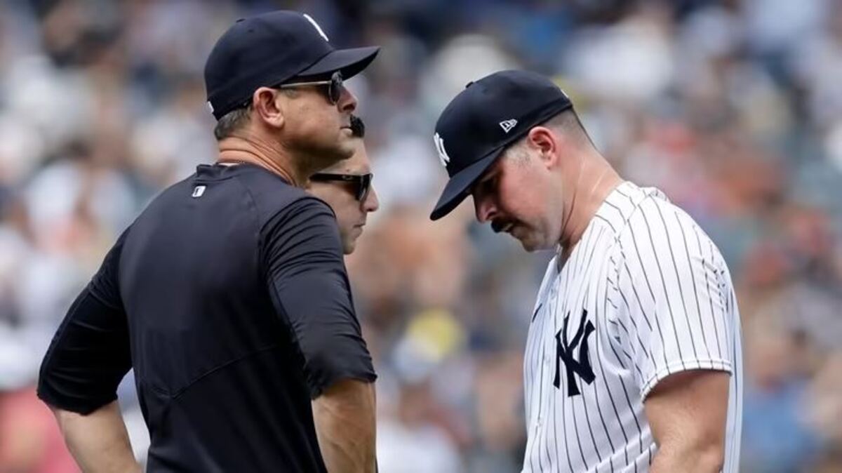 Yankees pitcher Carlos Rodon with manager Aaron Boone during the 2023 season.