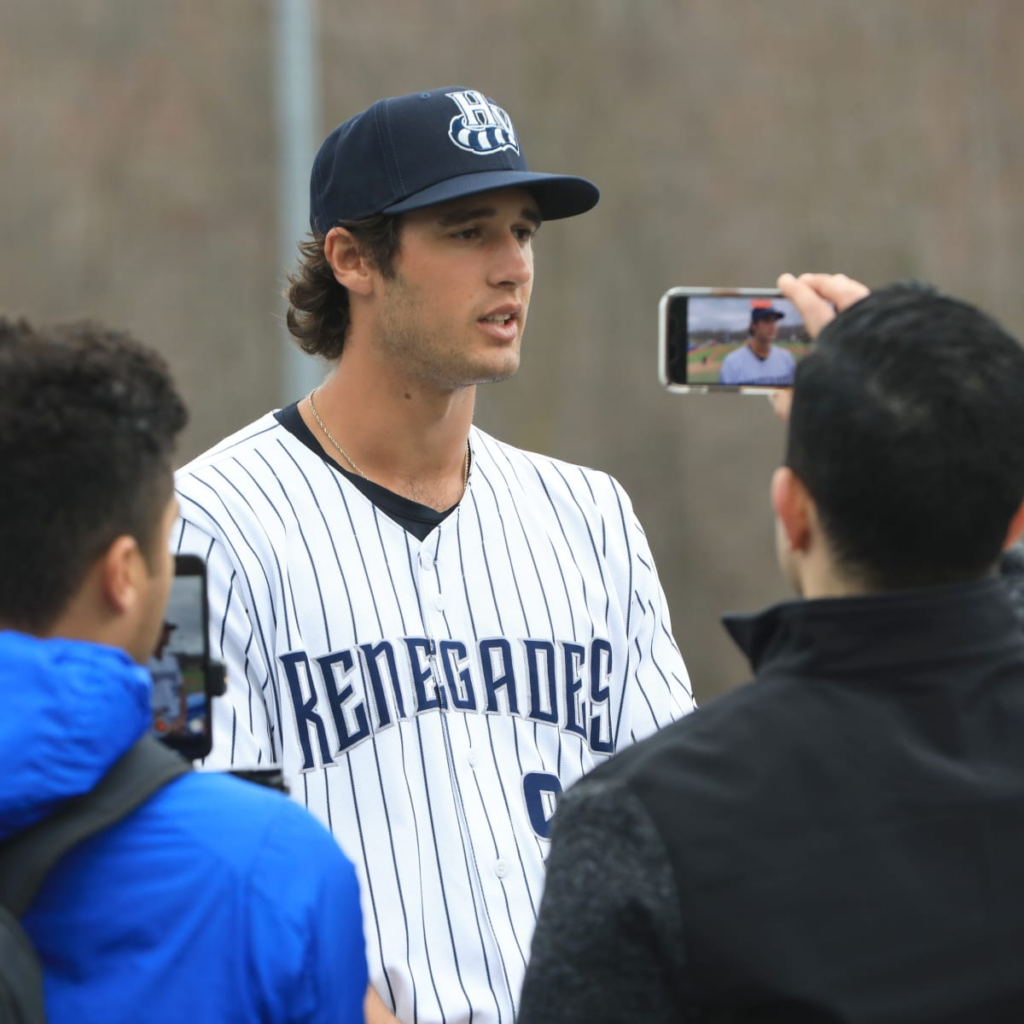 Spencer Jones, clad in his New York Yankees attire, displaying his talent on the baseball field, recognized as one of the top prospects in the team's farm system.
