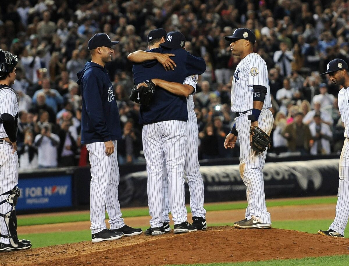 The 2013 New York Yankees saw Mariano Rivera retiring as he handed over the ball to Derek Jeter and Andy Pettitte in the ninth inning at Yankee Stadium on September 26, 2013.