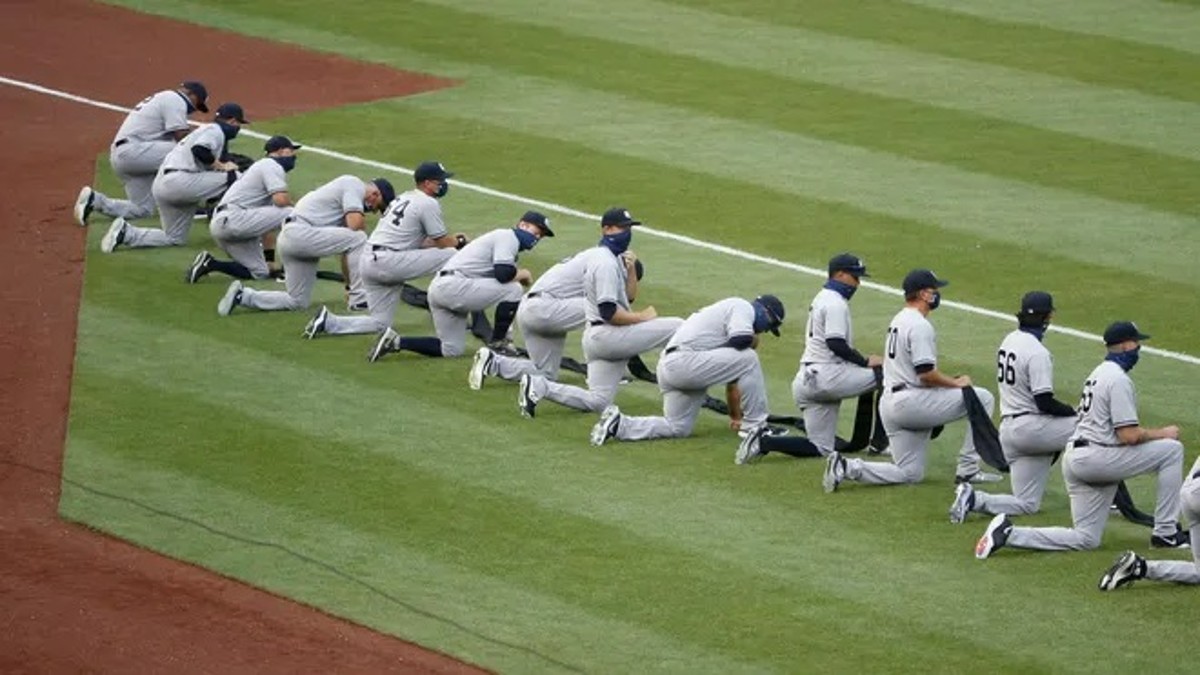 The 2020 New York Yankees team on the field on July 26, 2020, in Washington D.C.