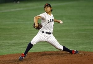 Shota Imanaga in Team Japan attire. New York Yankees refrain, citing MLB home run concerns. Chicago Cubs secure the coveted Japanese ace