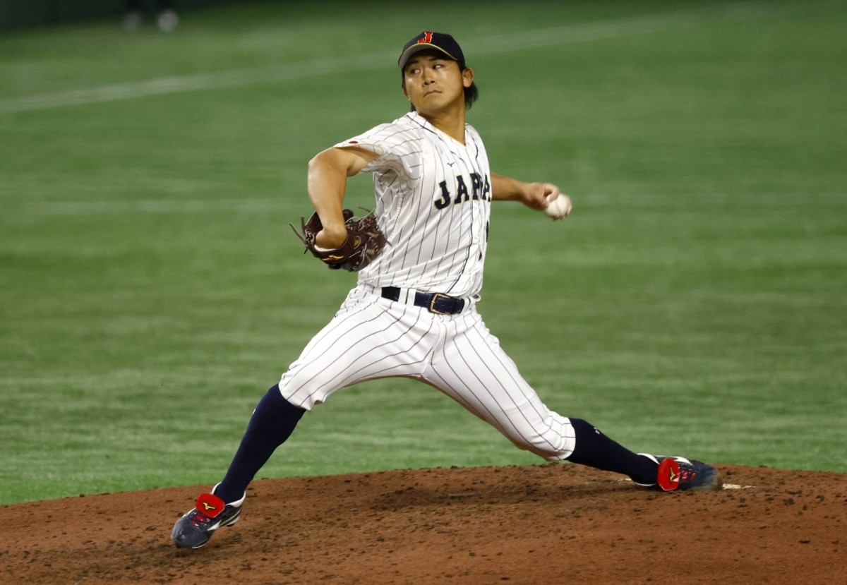 Shota Imanaga in Team Japan attire. New York Yankees refrain, citing MLB home run concerns. Chicago Cubs secure the coveted Japanese ace