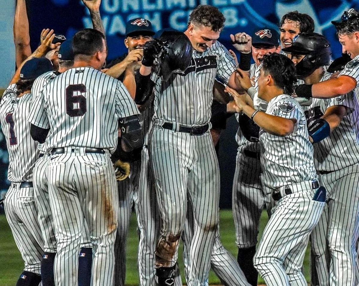 Yankees prospects are celebrating a victory at the Somerset Patriots in 2023.